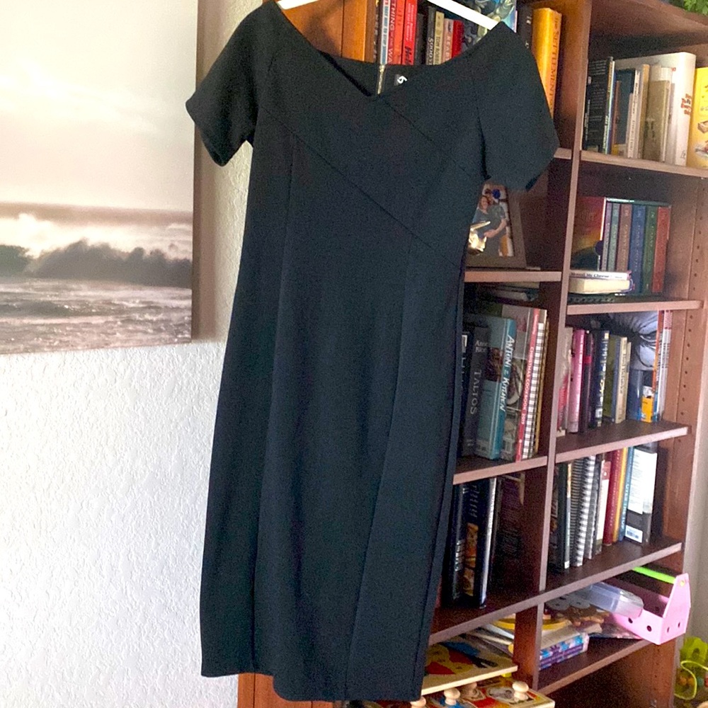 Black bodycon dress with cross cross detail